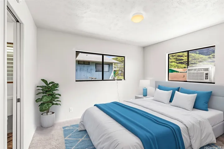 Primary bedroom with Half bath Enhanced Photo