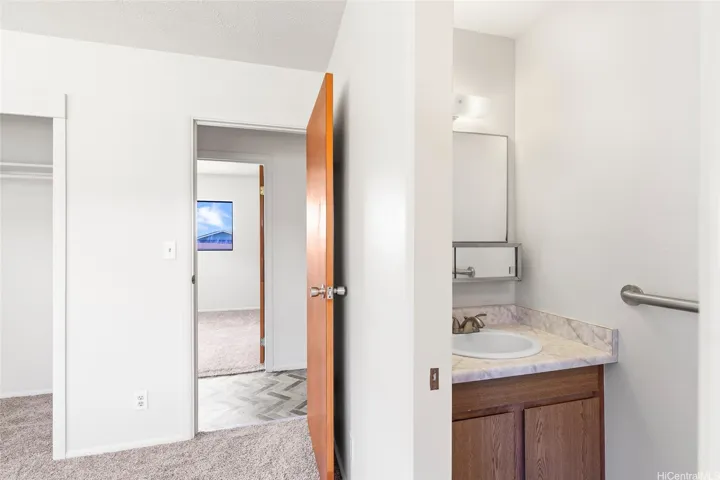 Primary Bedroom with half bath