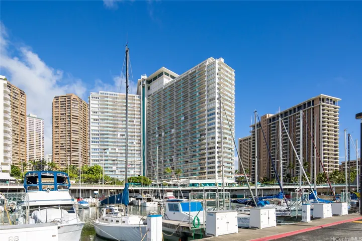The Ilikai Apartment Building is adjacent to the Ala Wai Boat Harbor and Yacht Club, made famous as the launching place in the opening credits of Gilligan's Island.