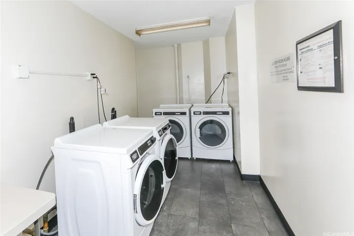 Community laundry room just steps away from the unit with card access, no coins needed.  Trash chutes on every floor just located next to elevators to make it easy to use.