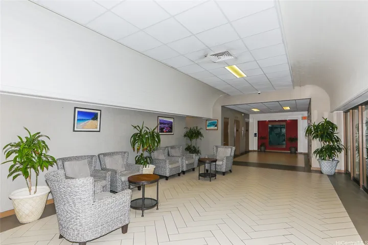 Updated Lobby for lounging. Resident managers office, beauty shop, mini mart and Seafood Restaurant all located downstairs.   Three elevators in lobby.