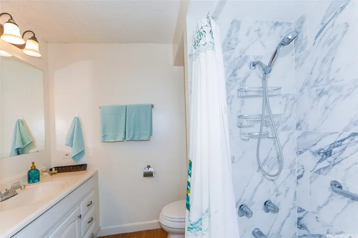 Clean white and bright bathroom.
