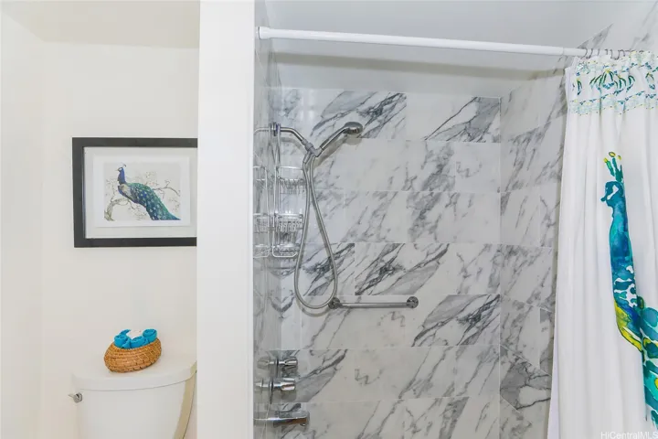 Walk in tile shower for easy access in and out and security bar for safety.  Large linen closet in bathroom as well.  Great storage for your towels and toiletries.