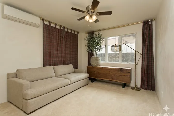 **virtually staged** One of the two cozy first floor bedrooms.