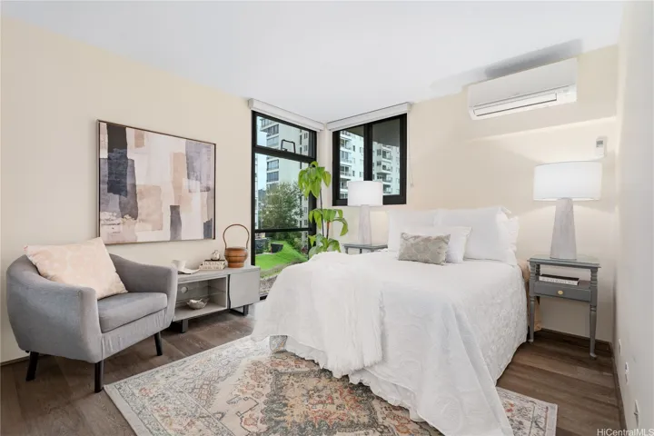 2nd large bedroom with AC, 2 windows, cross breezes & roller blinds.