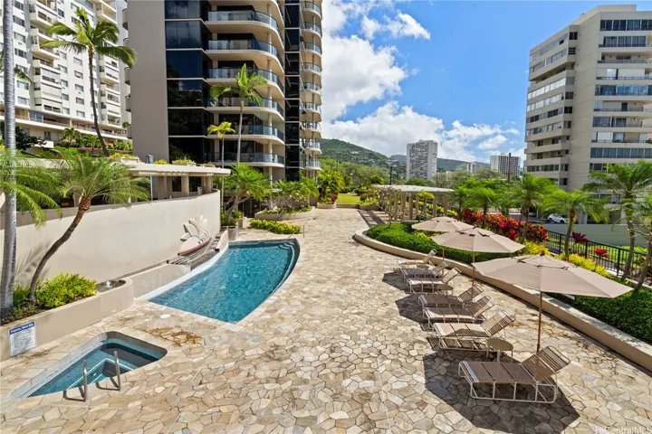 Jump right in! Refreshing pool & relaxing spa. BBQ area with tables & umbrellas.