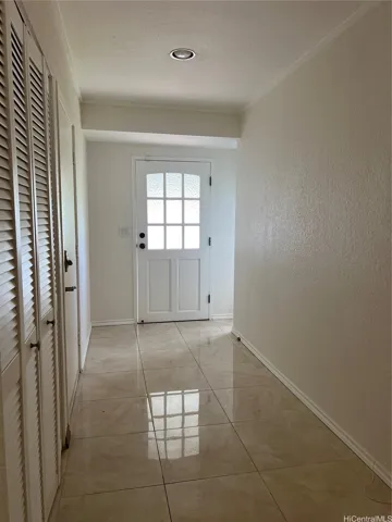 Interior entry, garage and washroom enter into this area.