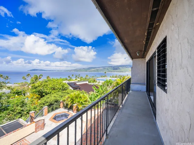 Wraparound covered lanai off the Primary Suite.