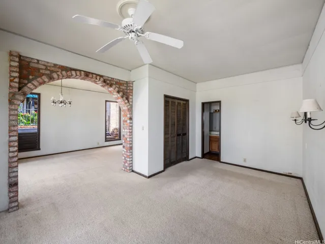 Additional permitted guest cottage of 528 sq. ft sits below the Main Home and provides privacy with a kitchenette, bathroom, large living area and ocean views.