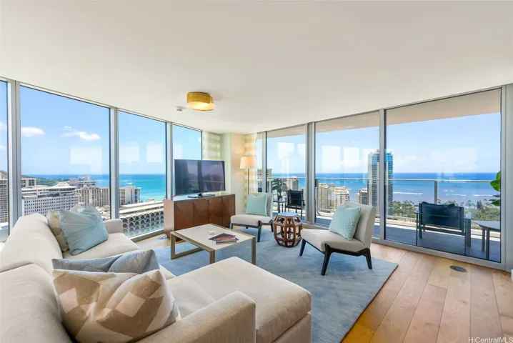 Rarely available high floor corner unit with 3 sides of floor to ceiling glass windows