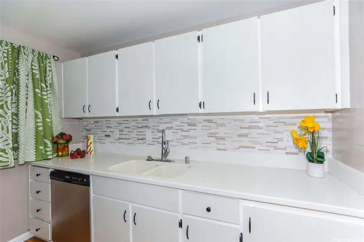 Freshened kitchen with
cabinet refacing ,new hardware and stylish backsplash