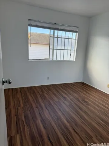 Breezy 3rd bedroom with luxury vinyl flooring