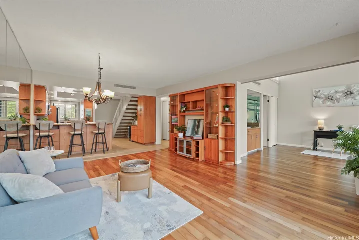 The main living space flows seamlessly into the potential primary suite, office, or living area!