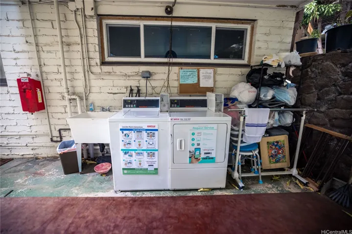 community laundry is right by the stairs from the unit