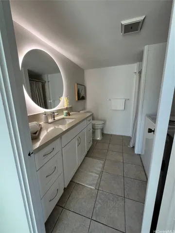 Downstairs Bathroom with washer and dryer