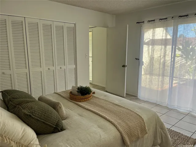 Primary bedroom looking out to lanai