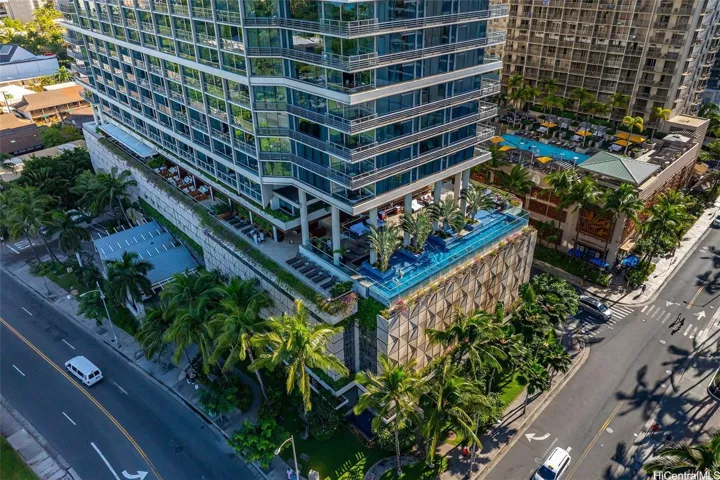 Elegant luxury exterior of building in a great location across from the beach, and close to a multitude of dining, entertainment options, shopping and a quick exit from Waikiki.