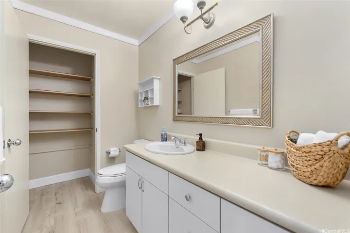 Half bath with more storage on first level.
