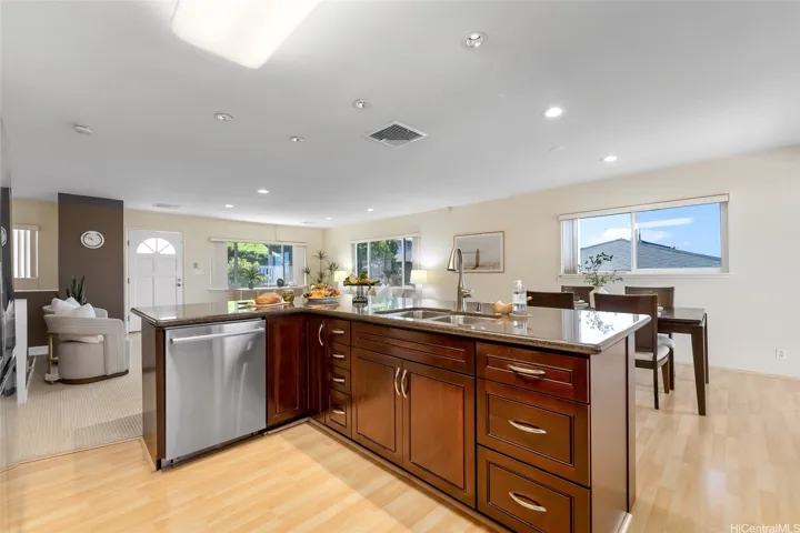 Dishwasher is Bausch and SS appliances. Kraft Maid wood cabinets are dovetailed.