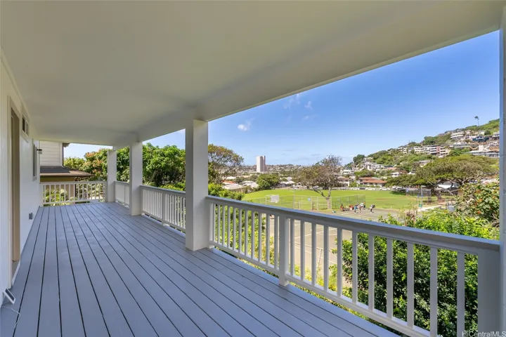 Covered lanais with Diamond Head views on first floor lanai. Sliding door off the dining room for easy access.