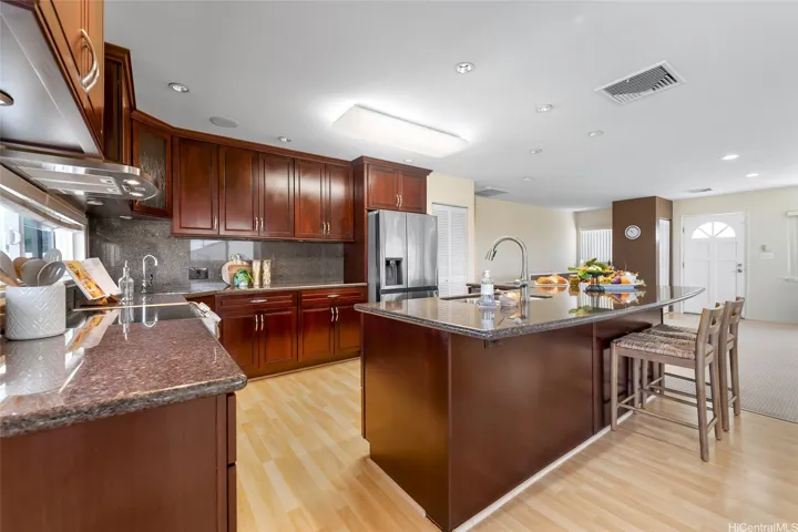 Kitchen cabinets are Kraftmaid.