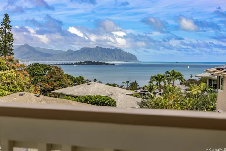 Zoomed views from the primary bedroom balcony of Coconut Island, Kaneohe Bay and the Ko'olau's