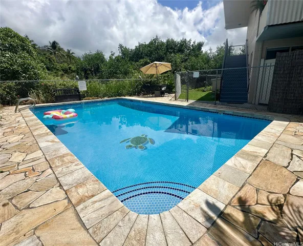 Pool is secure and fully fenced with Kawainui canal frontage.
