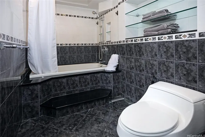 Bath and shower area in primary