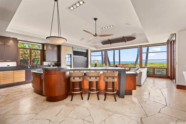 The main living area flows together with kitchen, dining, living and TV areas all within sight.
