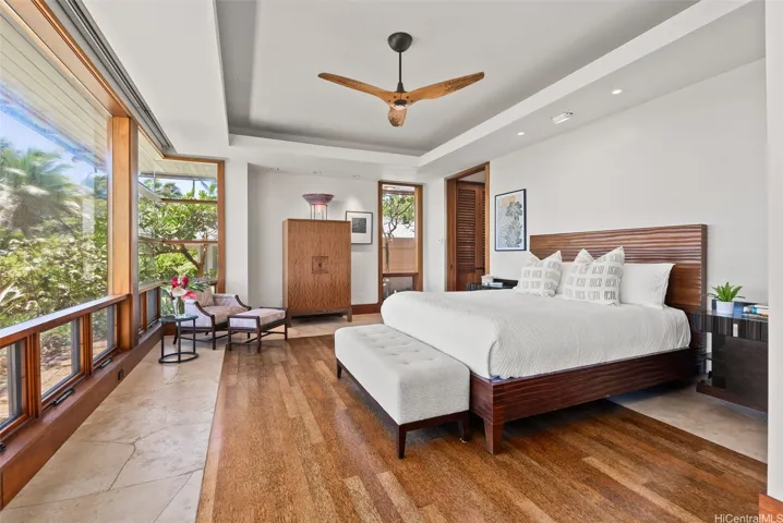 The primary bedroom opens onto an oceanfront lanai.