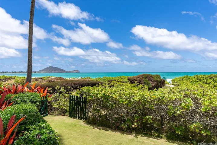 A beach gate across the yard offers easy access to the white sands of Kailua beach. The lot has 92' of beach frontage.