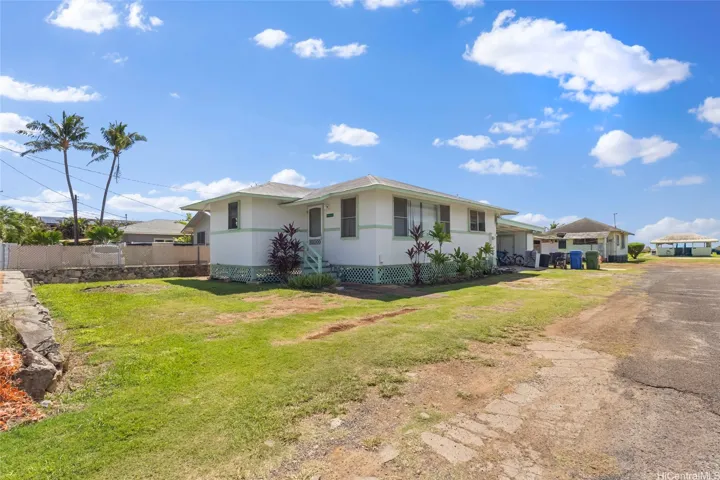 Street fronting house on left side.  3 bedrooms.