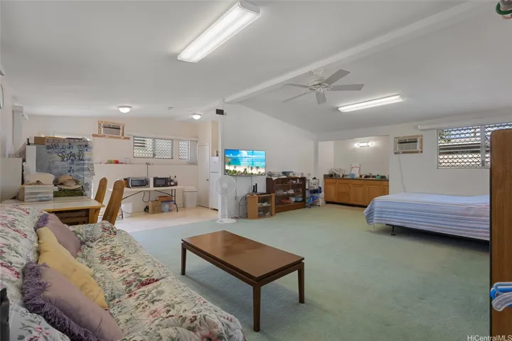 Interior of cottage, fronting street.