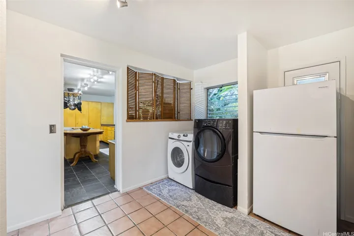 Spacious laundry/utility room off the kitchen. ENHANCED