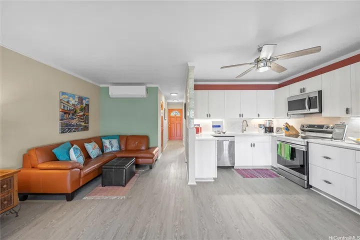 Your living room is adjacent to the open kitchen
