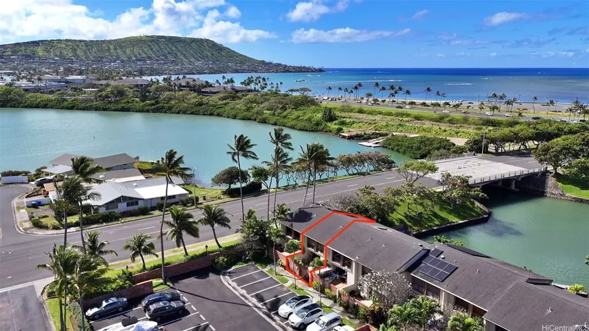 Aerial view of marina front residence 63 at the Moorings with a backdrop of Koko Kai