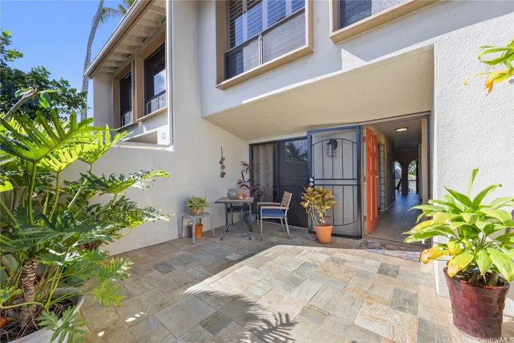 Spacious private front courtyard providing a place to relax and garden