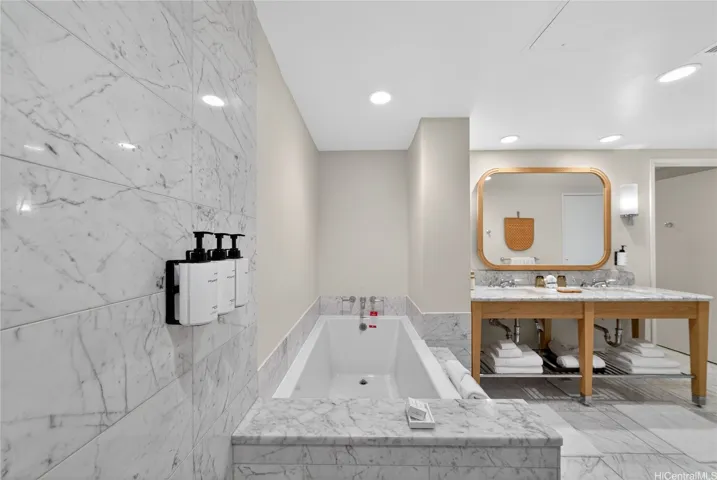 Primary Bathroom with private water closet, Toto washlet, soaking tub, and walk-in shower.