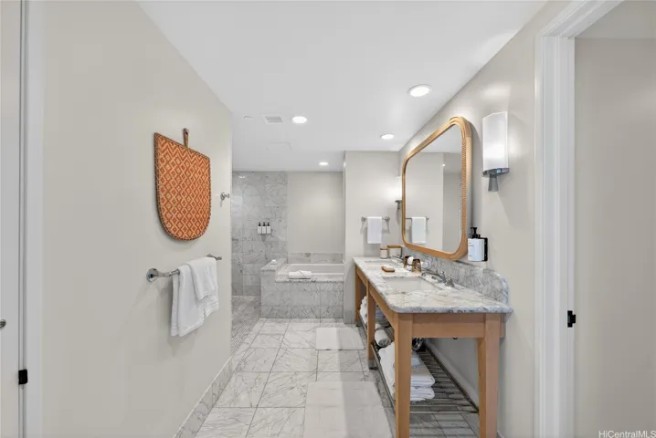 Primary Bathroom with private water closet, Toto washlet, soaking tub, and walk-in shower.