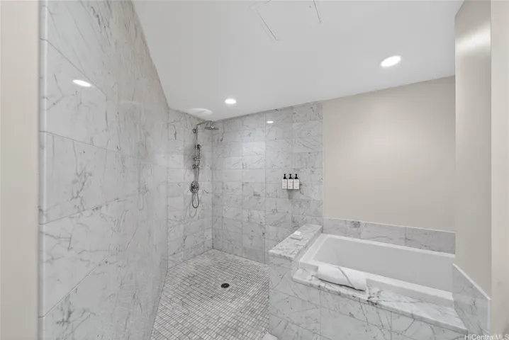 Primary Bathroom with private water closet, Toto washlet, soaking tub, and walk-in shower.