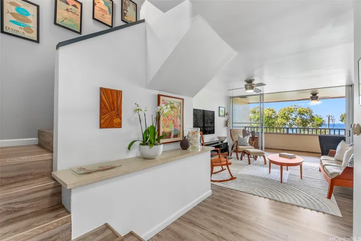 The entry and staircase to the bedroom level offer stylish display areas for your favorite art or decor.