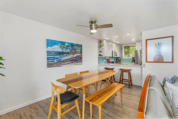 A dining area can accommodate table and seating for 6-8 people.