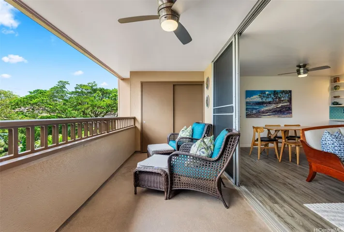 The lanai is wide enough for furniture to sit outside and relax from a long day. A large storage closet is featured at the end.