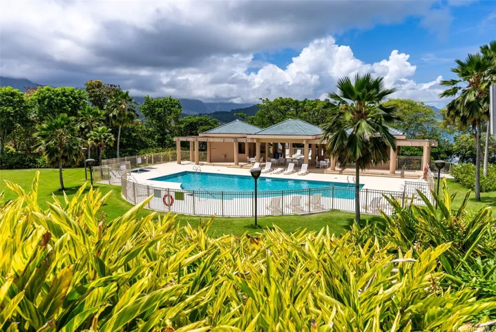 Poha Kea Point grounds are lush, colorful and well maintained. The pool and rec center are mostly surrounded by greenery, for privacy while owners enjoy these amenities.
