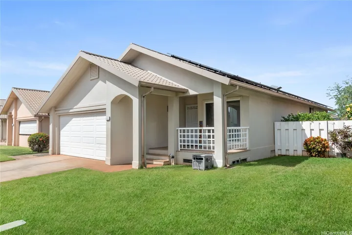 Charming curb appeal in the desirable, family-friendly Summerhill neighborhood. Just steps from Holomua Elementary!