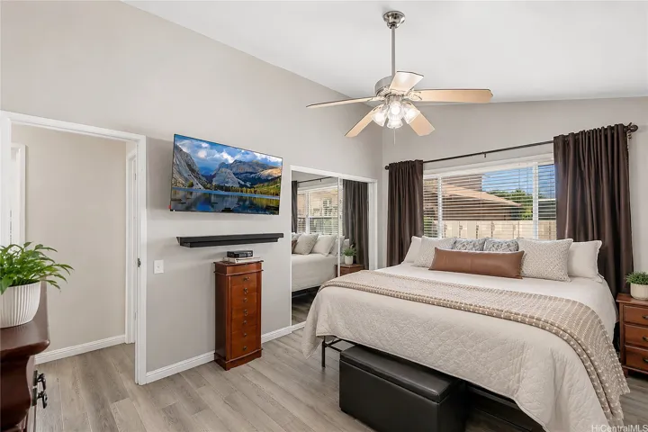 Your private sanctuary: a spacious primary bedroom designed for ultimate comfort and tranquility.
