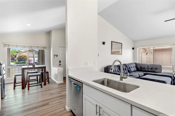 Seamless flow between the kitchen and dining areas, ideal for family gatherings and daily routines.