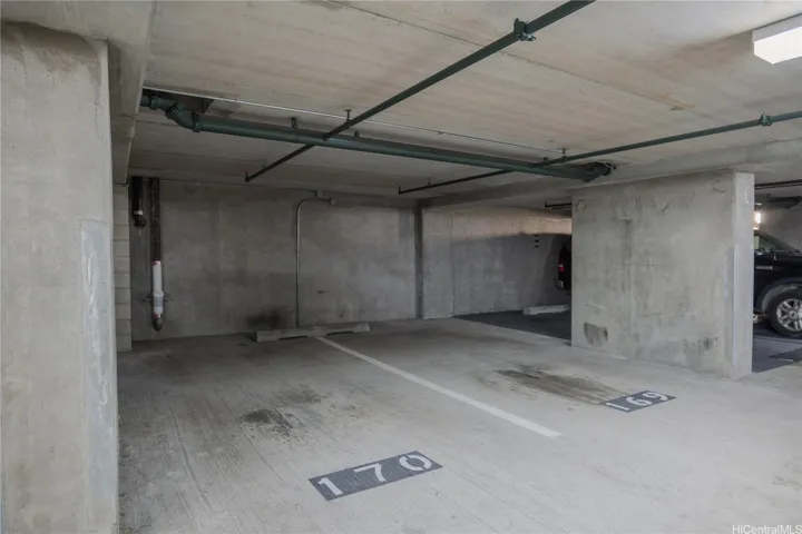 Secure, assigned, covered garage parking stall #170. Near the elevator which takes you up to the 6th floor unit.