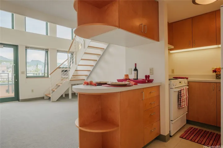 View of the kitchen and living room and lanai.