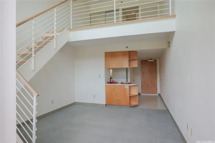 Stairs go up to the bedroom loft and bathroom.